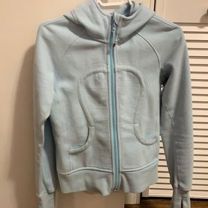 Light blue, gently used Lululemon Scuba zip up hoodie. Fits like a size 6.